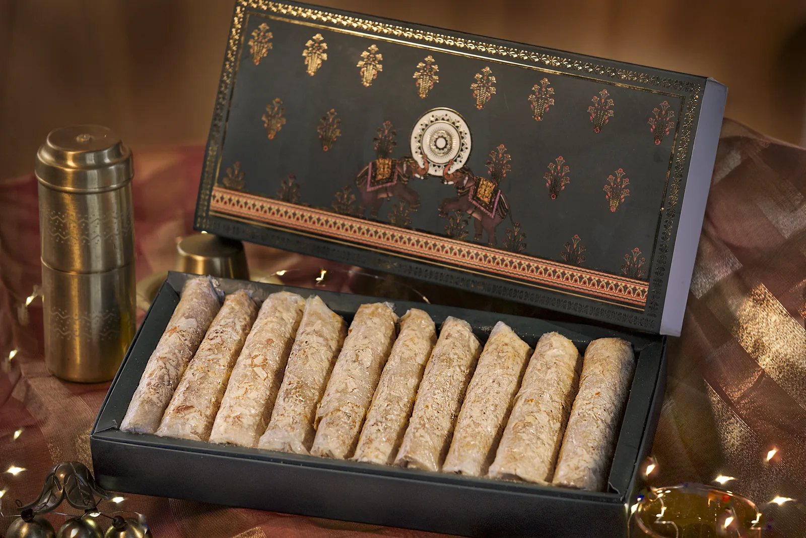 Hand-layered Andhra paper crepe sweets in their festive box